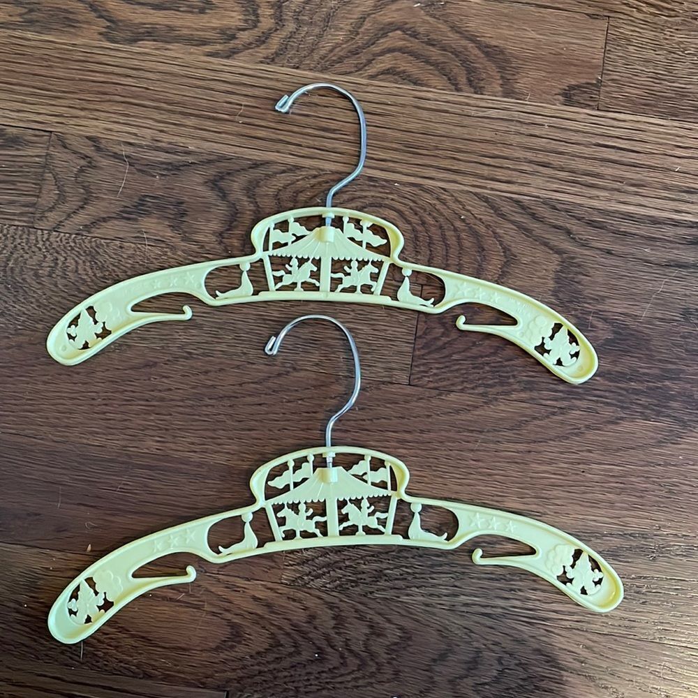 2‎ yellow plastic vintage child’s clothing hangers with circus theme